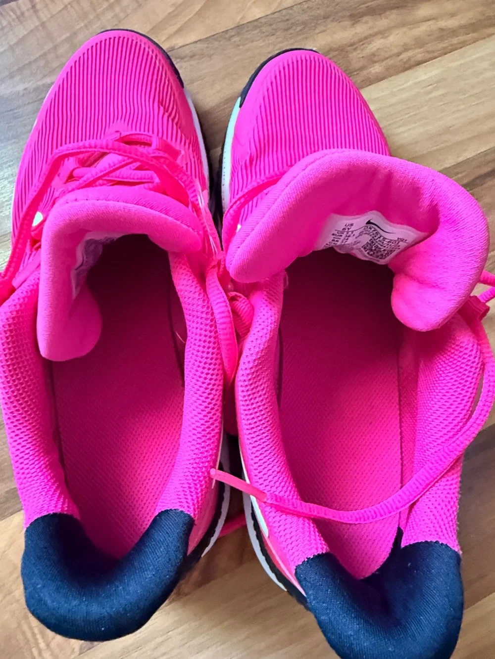 Nike Vibrant Pink Running Shoe with White Swoosh